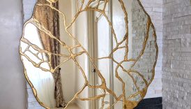 The Beauty and Elegance of Gold Wall Mirrors  