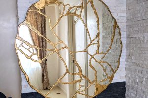 The Beauty and Elegance of Gold Wall Mirrors