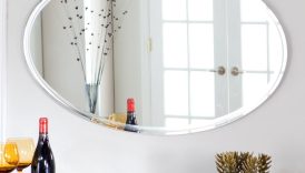 Maximizing Space and Style with an Oval Wall Mirror  